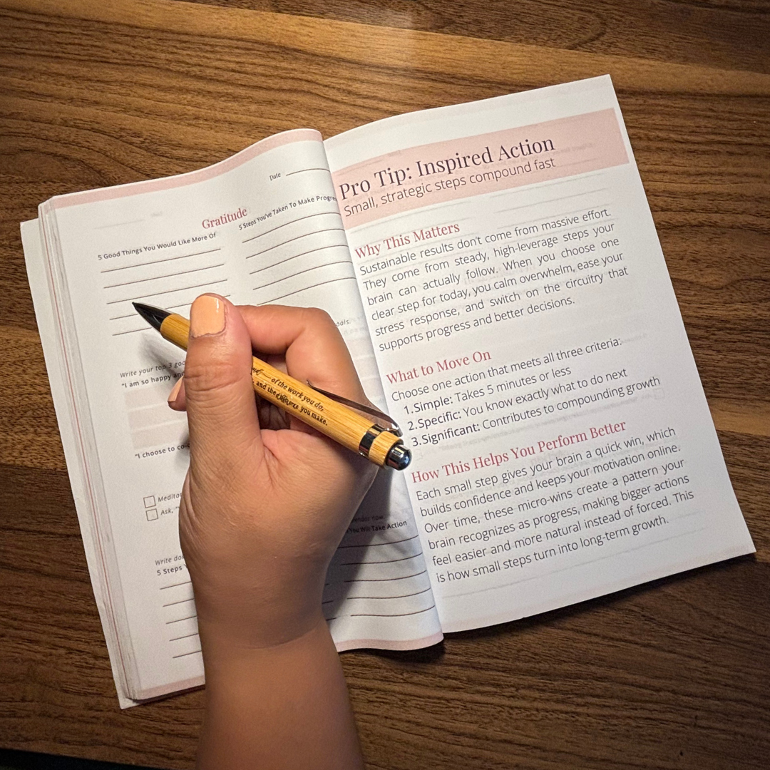 Hand completing a Time Energy Focus 90-day journal page focused on inspired action and sustainable performance by Diana Bejasa.