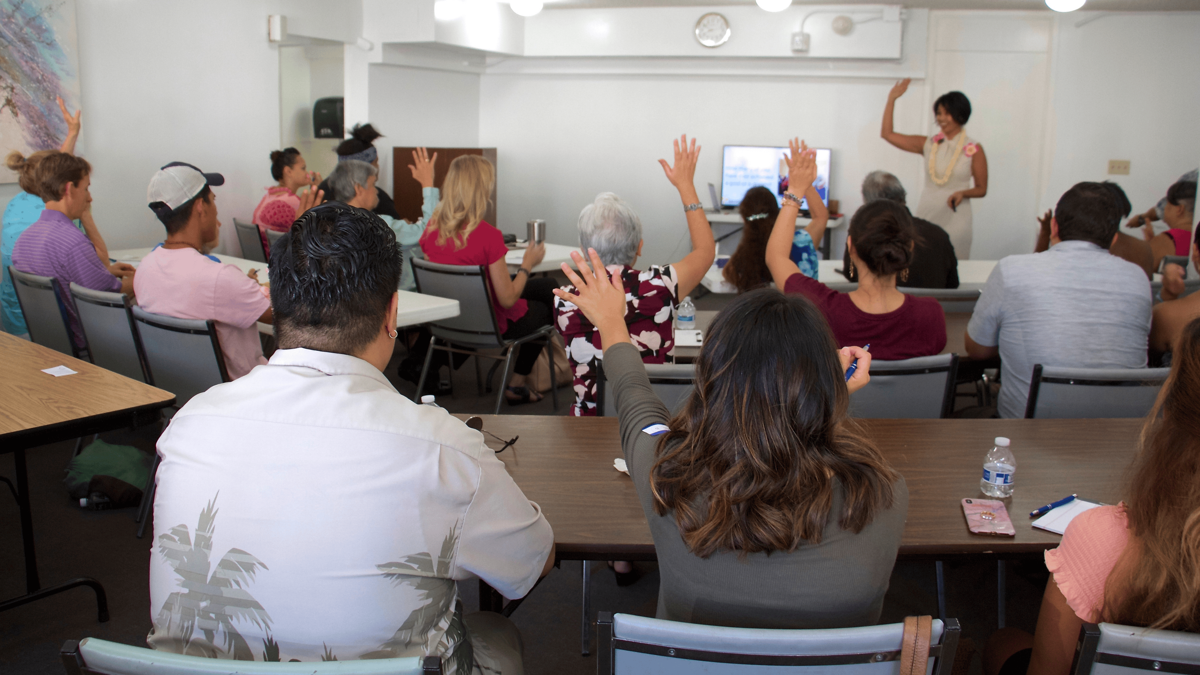 Diana Bejasa leading an interactive leadership workshop, engaging participants in discussion and reflection.
